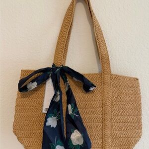 Elegant Tan Woven Tote Bag with Floral Scarf
